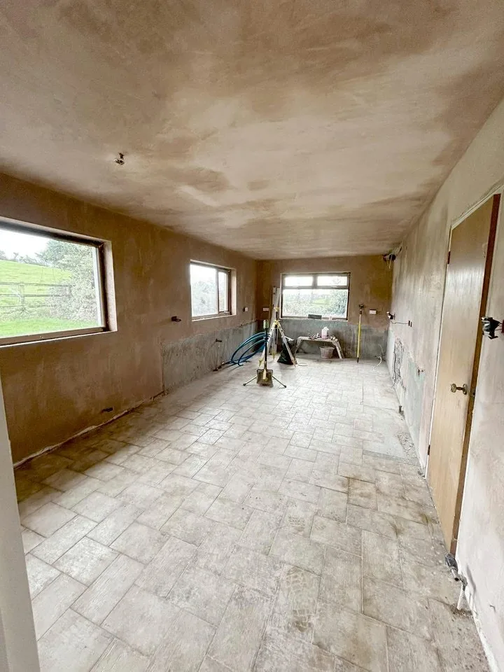 Long room plastered from end to end