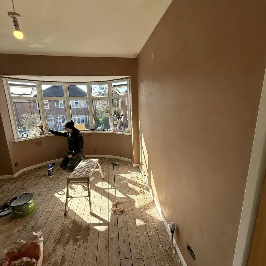 After: the same room freshly plastered