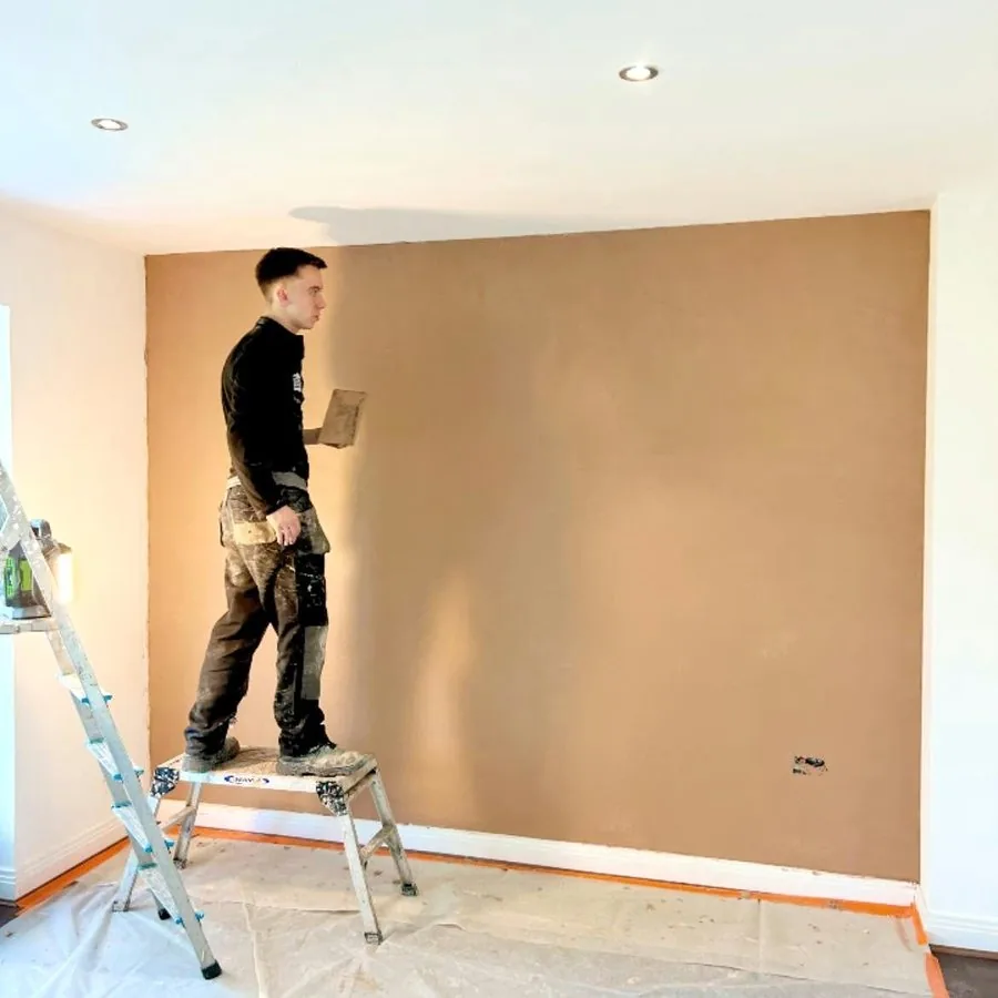 After: the same wall freshly plastered